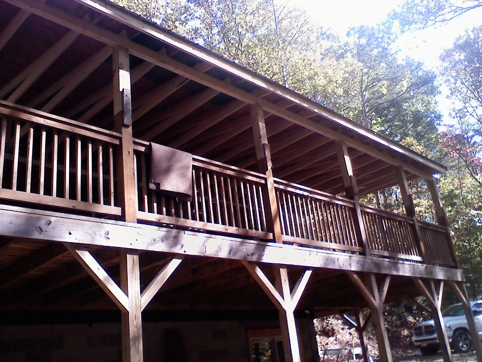 Timber framing under a new elevated porch and deck — Roof Leak Repair in Providence Forge by Roofing Brothers